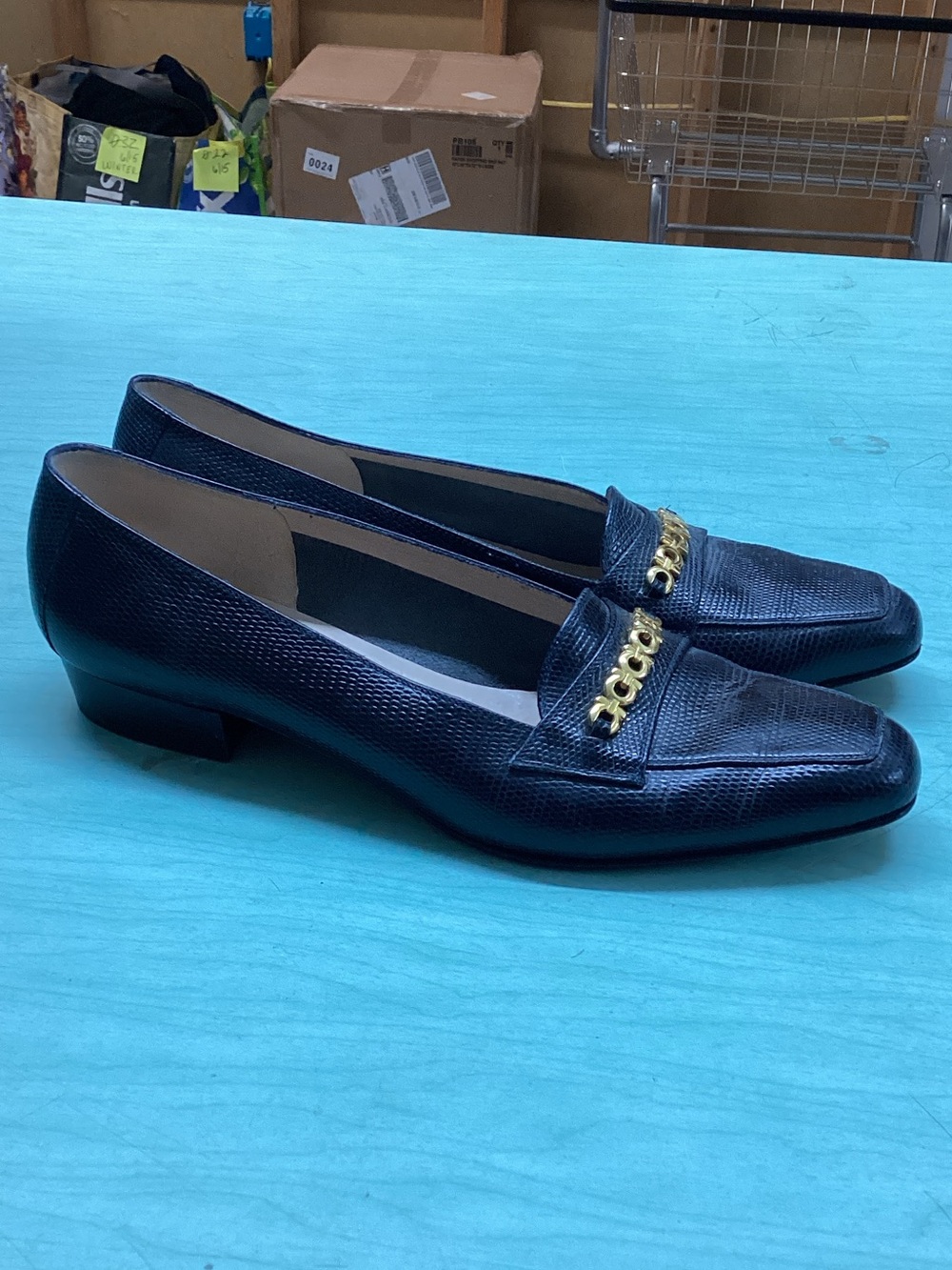 Salvatore Ferragamo Black Leather Loafers with Gold Chain Accent